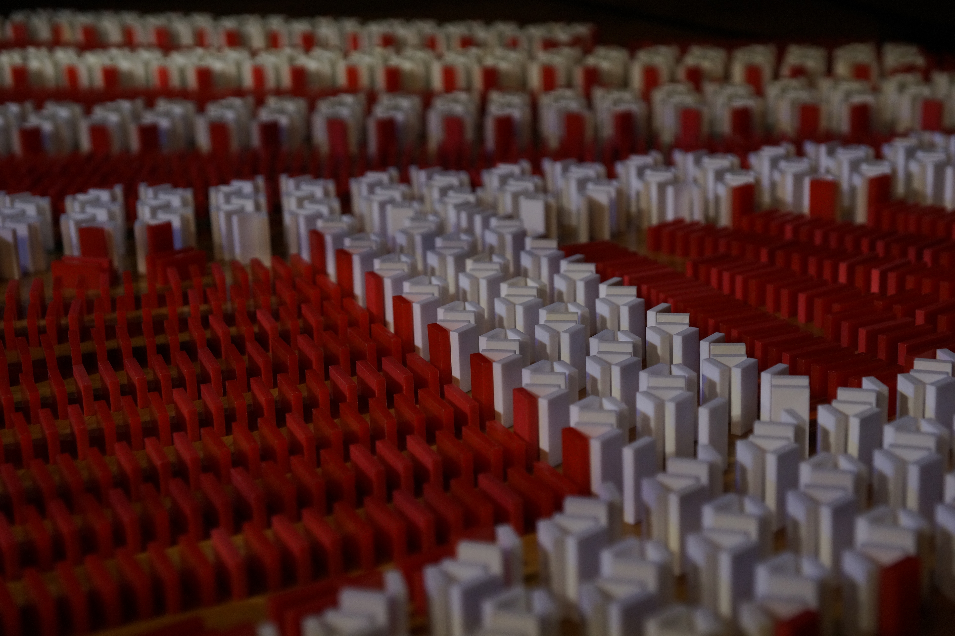 Dominoes showing the Austrian Domino Art logo